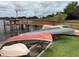 Community kayak storage near the dock and water at 4312 Lake Underhill Rd # 19-B, Orlando, FL 32803