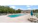 Enjoy a swim in this community pool surrounded by picnic tables and plenty of trees and lush greenery at 4312 Lake Underhill Rd # 19-B, Orlando, FL 32803