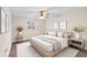Stylishly decorated bedroom with a ceiling fan, neutral tones, and ample natural light at 4312 Lake Underhill Rd # 19-B, Orlando, FL 32803