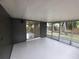 Enclosed patio featuring access to the home's interior and screened openings providing natural light at 4883 Cherokee Rose Dr, Orlando, FL 32808