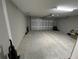 Spacious two car garage providing ample parking and storage space at 51 Fir Dr, Ocala, FL 34472