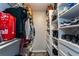 Organized walk-in closet with shelving, drawers, and ample space for clothing and accessories at 5287 Cypress Ct # 724, Orlando, FL 32811
