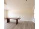 Well-lit dining room featuring hardwood floors, and ample space for entertaining at 6569 Long Breeze N Rd, Orlando, FL 32810
