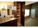 Bathroom featuring sink and vanity with built-in shelves and drawers at 687 N Endeavour Dr, Winter Springs, FL 32708