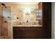 Beautiful bathroom featuring double vanity, granite countertop, decorative tile accents, and walk-in shower at 687 N Endeavour Dr, Winter Springs, FL 32708