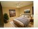 Bedroom featuring a decorative rug, wooden bed frame, and wooden blinds at 687 N Endeavour Dr, Winter Springs, FL 32708