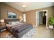 Spacious bedroom with neutral paint, vaulted ceiling and ensuite bathroom access at 687 N Endeavour Dr, Winter Springs, FL 32708