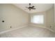Bright bedroom with a ceiling fan, neutral walls, and large window letting in natural light at 687 N Endeavour Dr, Winter Springs, FL 32708