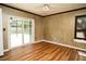 Bright, sun-filled bedroom with wood floors, access to the pool area, and plenty of natural light at 687 N Endeavour Dr, Winter Springs, FL 32708