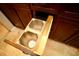 Kitchen dark wood cabinets with pull out double trash can at 687 N Endeavour Dr, Winter Springs, FL 32708