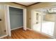 View of room with open closet and sliding glass door leading to lanai at 687 N Endeavour Dr, Winter Springs, FL 32708