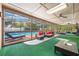 Spacious pool enclosure with ample seating and a view of the pool at 7852 Broken Arrow Trl, Winter Park, FL 32792