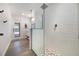 Modern walk-in shower with decorative tile and glass partition at 7852 Broken Arrow Trl, Winter Park, FL 32792