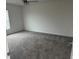 Cozy bedroom with plush carpeting and a large window for natural light at 798 Kapi Dr, Groveland, FL 34736
