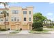 Inviting two-story townhome with a private garage, a welcoming entryway, and manicured landscaping enhancing curb appeal at 8024 Cool Breeze Dr # 132, Orlando, FL 32819