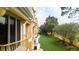 Townhome exterior features manicured lawn and private balconies at 8024 Cool Breeze Dr # 132, Orlando, FL 32819