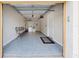 Clean, organized garage space with epoxy floors, laundry area, and ample shelving at 8024 Cool Breeze Dr # 132, Orlando, FL 32819