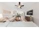 Bright open-concept living room and dining area with modern furnishings and decor at 8024 Cool Breeze Dr # 132, Orlando, FL 32819