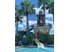 Community pool area with a tower, slide and a pool at 8495 Lake Amhurst Trl, Orlando, FL 32829