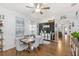 Open dining area with updated decor, perfect for entertaining guests at 8495 Lake Amhurst Trl, Orlando, FL 32829