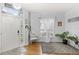 Bright entryway features stylish decor and lots of natural light at 8495 Lake Amhurst Trl, Orlando, FL 32829