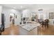 Open-concept kitchen featuring granite countertops and modern appliances with an eat-in dining space at 8495 Lake Amhurst Trl, Orlando, FL 32829