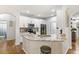 Modern kitchen with stainless steel appliances, granite counters, and ample storage space at 8495 Lake Amhurst Trl, Orlando, FL 32829