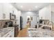 Stylish kitchen with granite countertops, modern appliances, and sleek cabinetry at 8495 Lake Amhurst Trl, Orlando, FL 32829