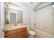 Bathroom featuring a vanity and a shower over tub at 9140 Grey Moss Dr, Orlando, FL 32832