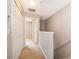 Upstairs hallway with carpeted floor at 9140 Grey Moss Dr, Orlando, FL 32832
