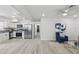 Open-concept layout featuring stainless steel appliances and ample countertop space at 1002 Cypress Ave, Sanford, FL 32771