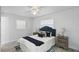 Cozy bedroom with a padded headboard bed, bedside tables and soft, natural light at 1002 Cypress Ave, Sanford, FL 32771