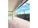 Covered patio featuring brick pavers and a screened enclosure overlooking the pool at 1016 Fountain Coin Loop, Orlando, FL 32828