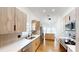 Modern kitchen features updated appliances, countertops, and stylish cabinetry at 10747 Satinwood Cir, Orlando, FL 32825