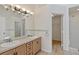 Bathroom with double sink vanity, tile floors and walk-in shower at 10828 Cherry Oak Cir, Orlando, FL 32817