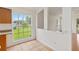 Bright kitchen nook featuring a large window and tile floors at 10828 Cherry Oak Cir, Orlando, FL 32817