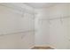 Spacious walk-in closet with multiple wire shelves for optimal storage and organization at 10828 Cherry Oak Cir, Orlando, FL 32817