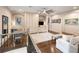 Comfortable upstairs living room with desk, cabinets, a ceiling fan and hardwood floors at 11106 Coniston Way, Windermere, FL 34786