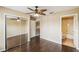 Bedroom featuring wood floors and ensuite bathroom at 1275 Shallcross Ave, Orlando, FL 32828