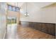 Open living room with high ceilings, natural light, and beautiful hardwood floors at 1275 Shallcross Ave, Orlando, FL 32828