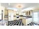 Bright kitchen featuring custom cabinets, granite countertops, and stainless steel appliances at 1477 Shadwell Cir, Lake Mary, FL 32746