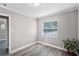 This sunny bedroom has modern flooring and neutral paint, ready for your personal touch at 1502 S Summerlin Ave, Sanford, FL 32771