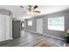 Inviting living area flowing into a modern kitchen, perfect for entertaining and everyday living at 1502 S Summerlin Ave, Sanford, FL 32771