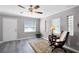 Serene living room featuring neutral walls, ample natural light, and modern flooring at 1502 S Summerlin Ave, Sanford, FL 32771