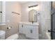 Stylish bathroom featuring a modern vanity, updated fixtures, and elegant tile work at 1505 Delaney Ave, Orlando, FL 32806