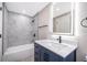 Modern bathroom with updated fixtures and new marble countertops at 1505 Delaney Ave, Orlando, FL 32806