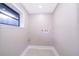 Laundry room featuring hookups and window to allow natural light at 1505 Delaney Ave, Orlando, FL 32806