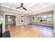 Charming living room with hardwood floors and a cozy fireplace at 1505 Delaney Ave, Orlando, FL 32806