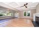 Bright living room with hardwood floors, fireplace, and lots of natural light at 1505 Delaney Ave, Orlando, FL 32806