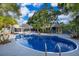 Beautiful pool with well-maintained landscaping, offering a serene and private outdoor retreat with easy access to the house at 1505 Delaney Ave, Orlando, FL 32806